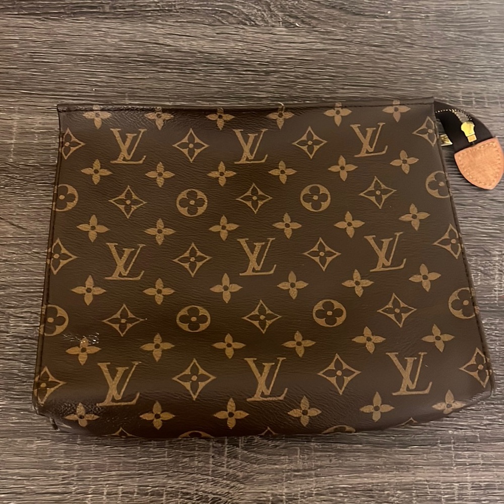 Authentic Louis Vuitton Poche Toilette bag